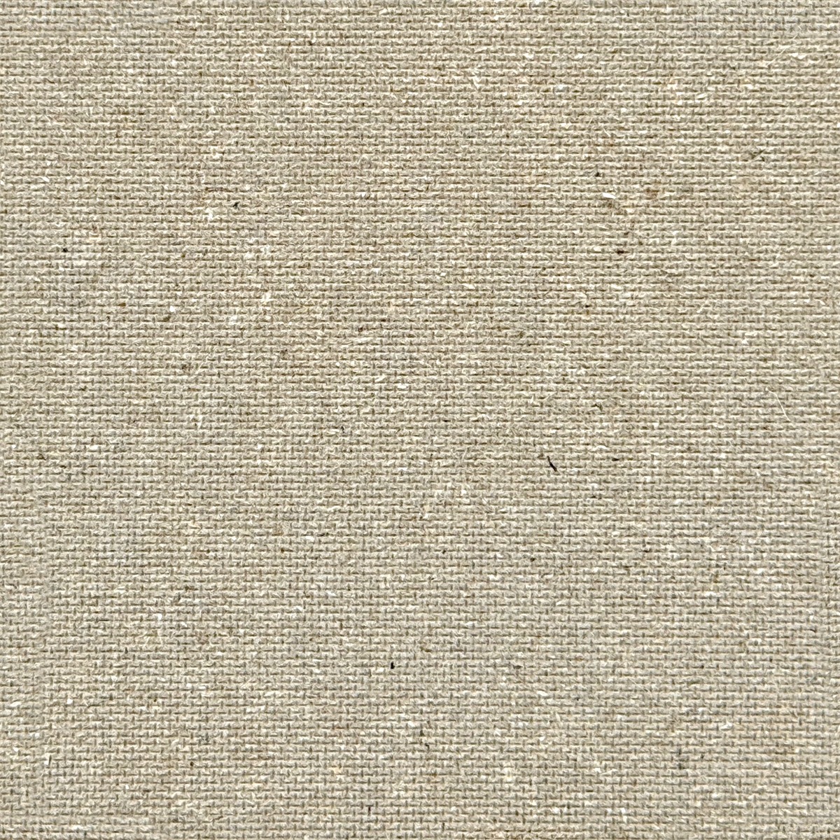 close-up of natural beige hemp fabric with coarse woven texture and organic irregularities