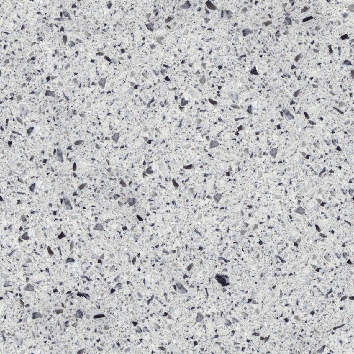 Seamless gray terrazzo flooring with dark aggregate chips, ideal for modern interiors and commercial spaces.