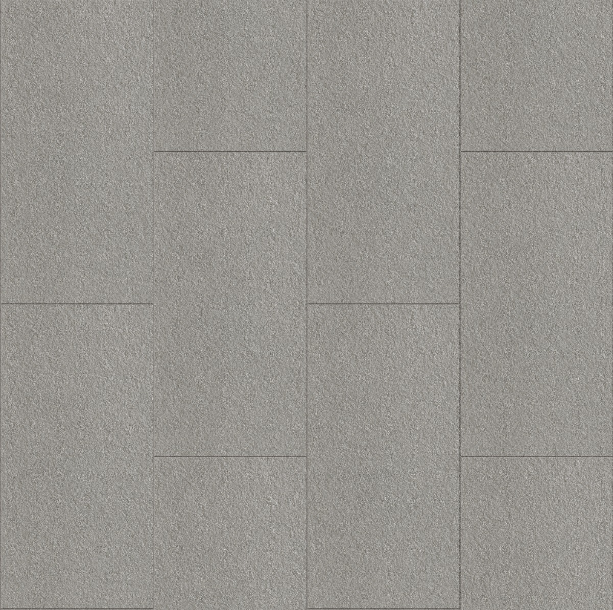 rough graphite grey concrete plates arranged in a modular rectangular pattern with coarse texture