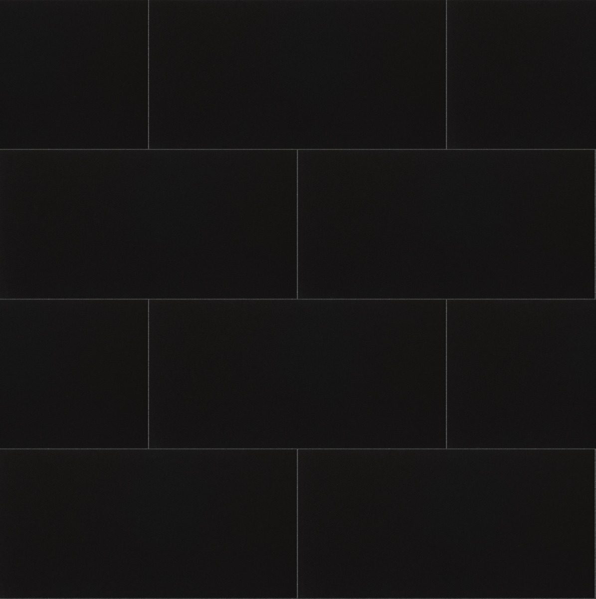 Dark matte black brick paving with a smooth surface, suitable for outdoor or indoor flooring.
