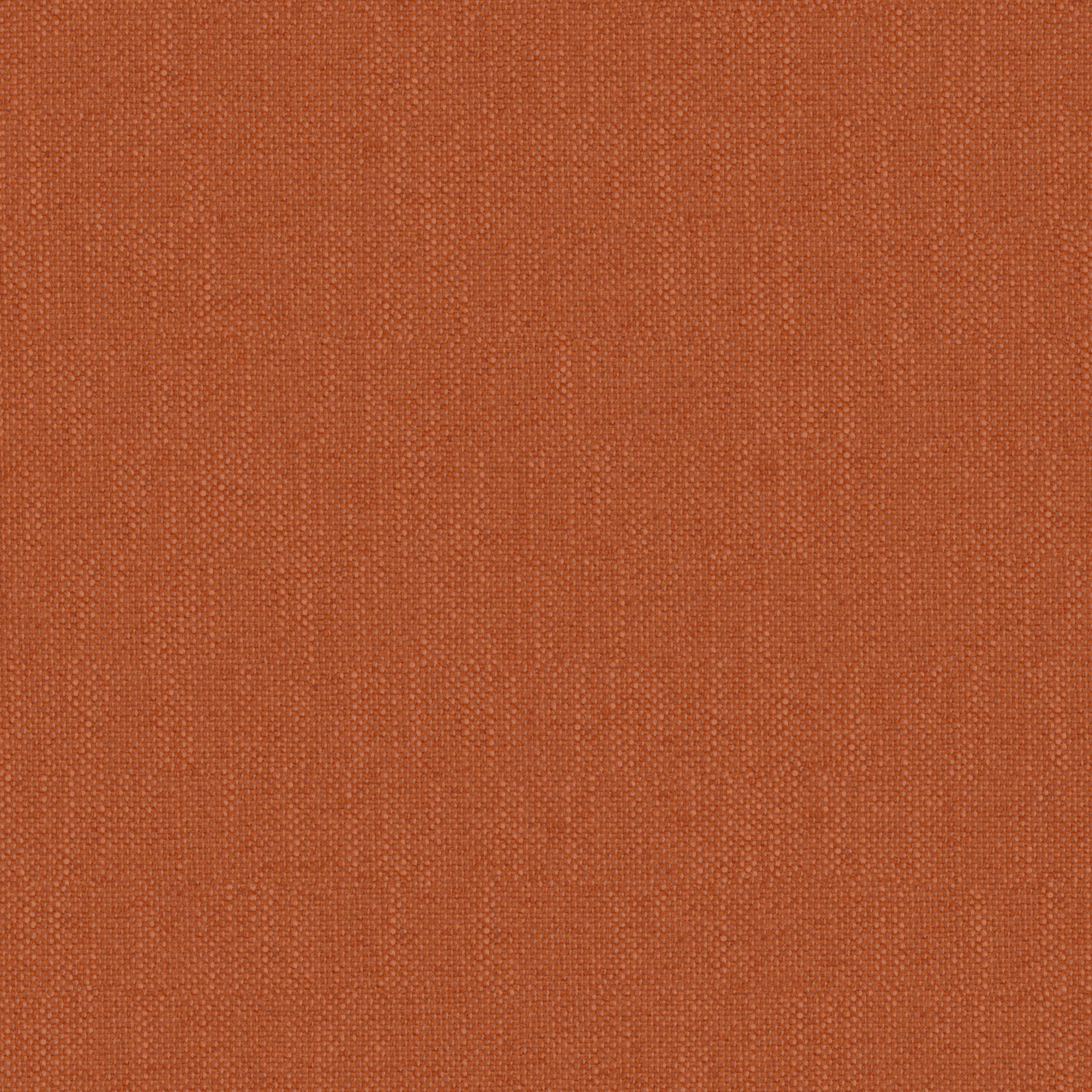 Close-up of terracotta orange woven upholstery fabric with fine weave pattern and matte finish