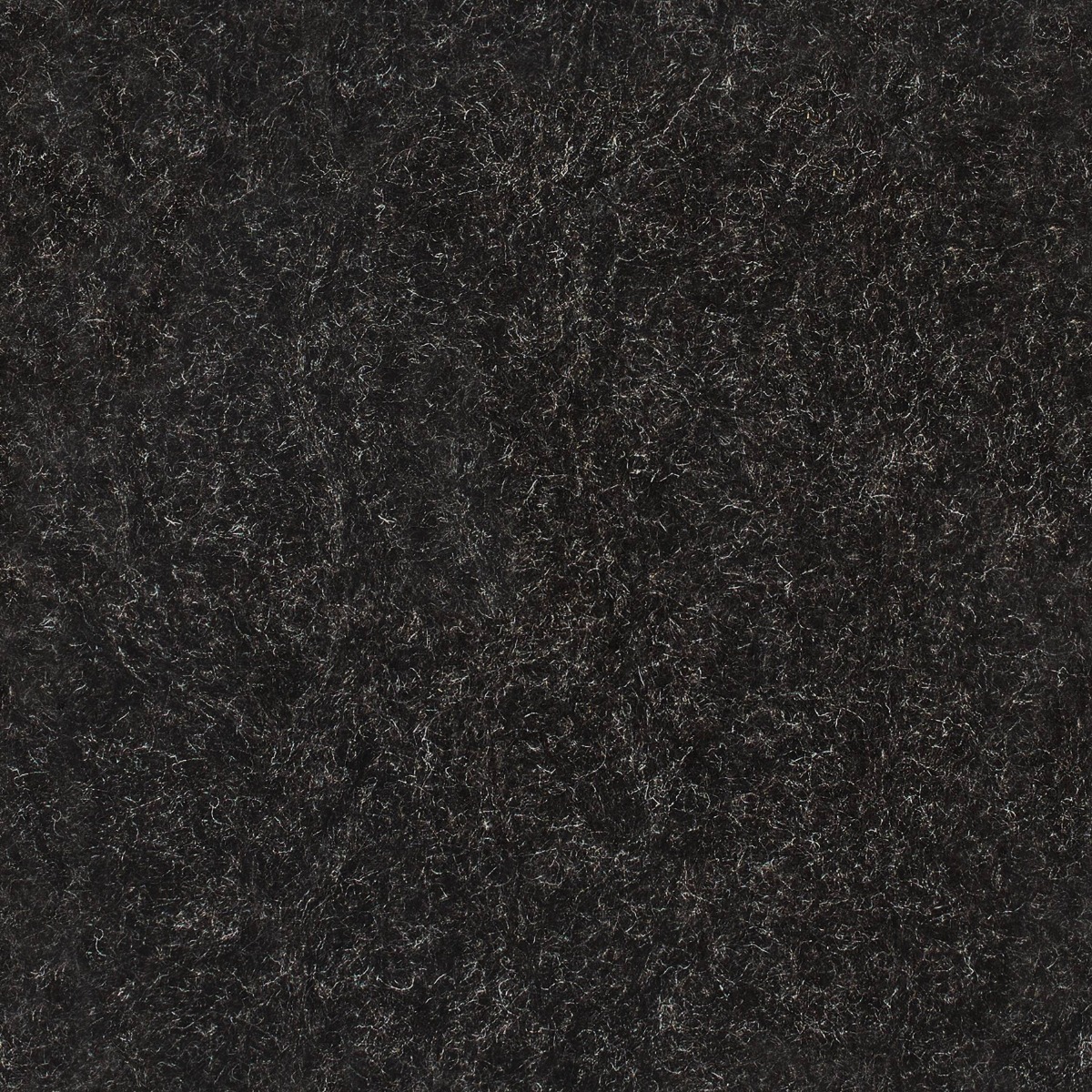 dark grey to black dense Herdwick wool fabric with natural fibers and a fuzzy texture for upholstery