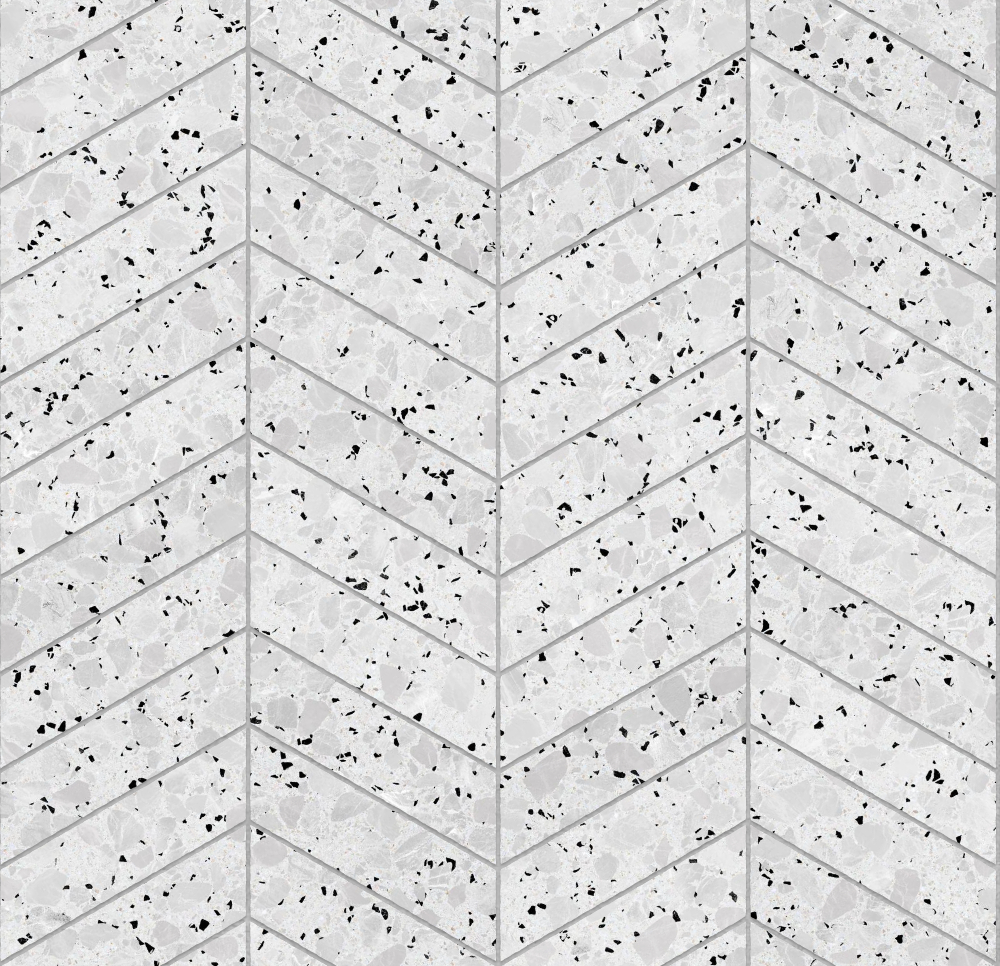 Light grey terrazzo tiles with black and grey speckles in a chevron pattern, suitable for flooring or wall decor.