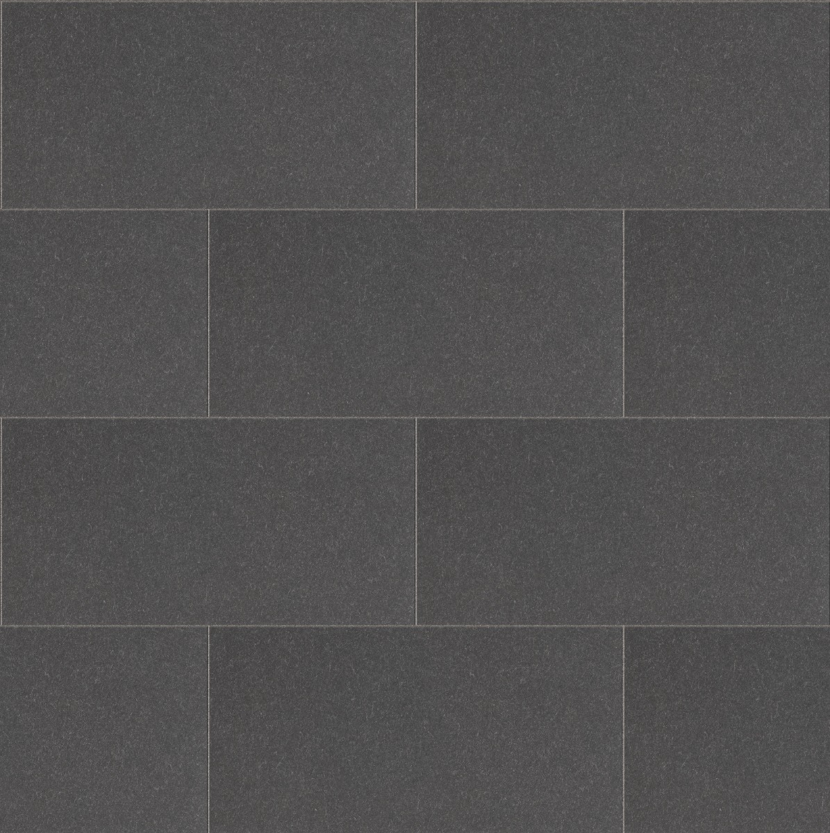 smooth anthracite dark grey stone tiles arranged in a staggered brick pattern for flooring or walls