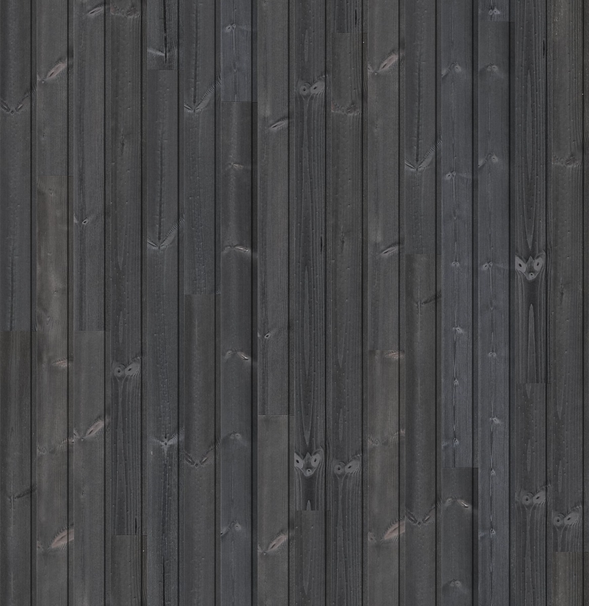 Dark charred redwood wood planks with visible grain and knots arranged vertically for wall cladding