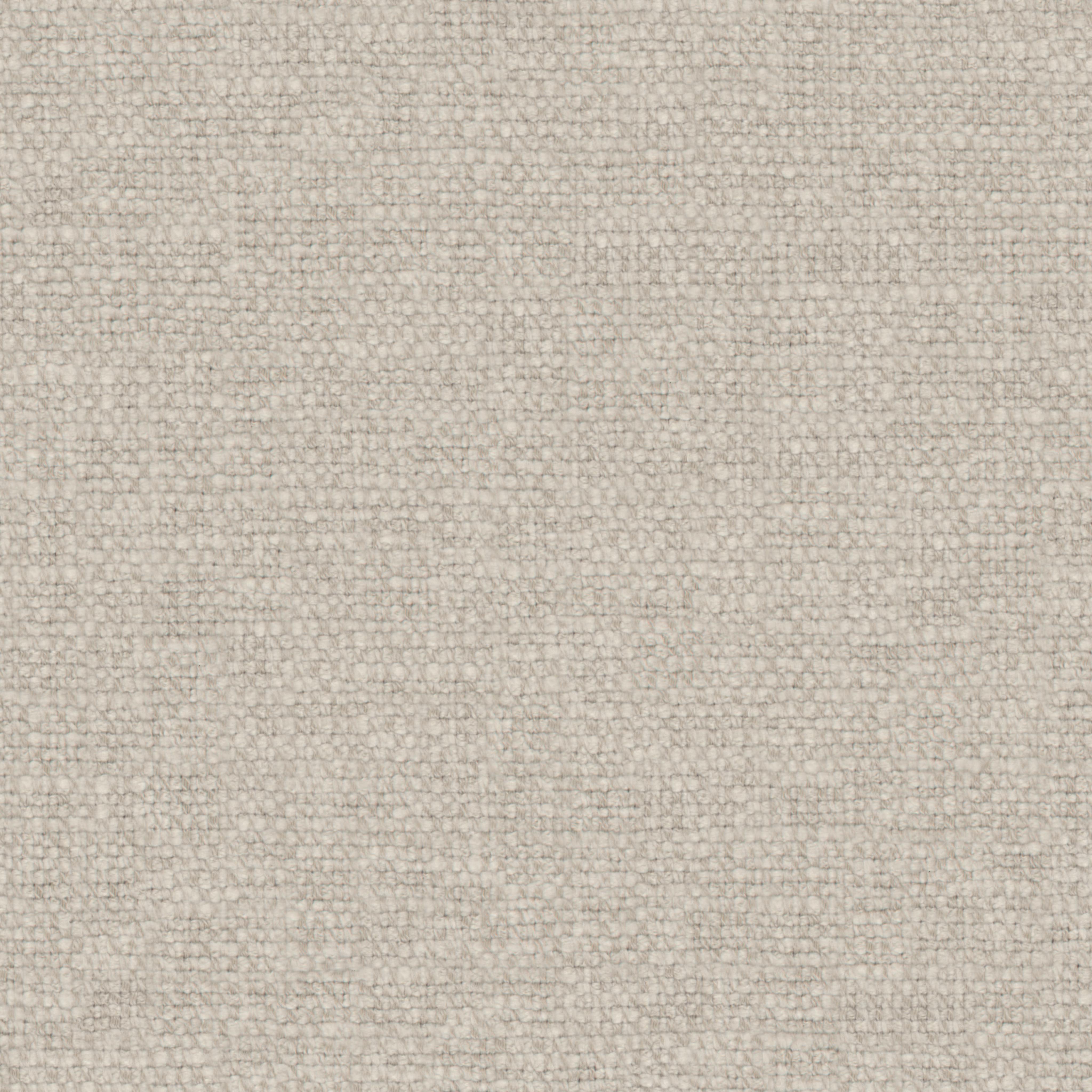 close-up of light beige woven upholstery fabric with coarse texture and tight weave