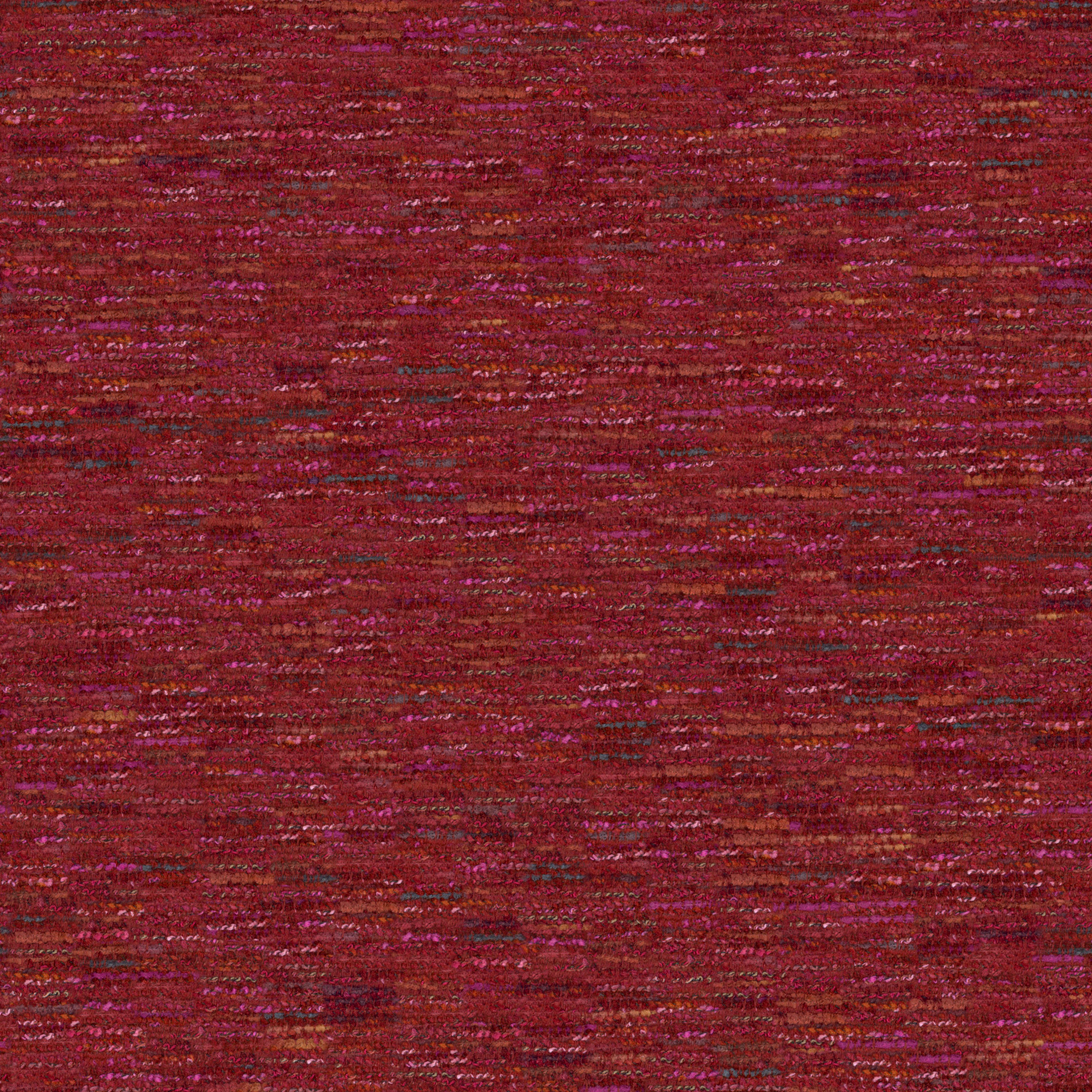 Close-up of red wool bouclé upholstery fabric with textured looped surface and organic pattern