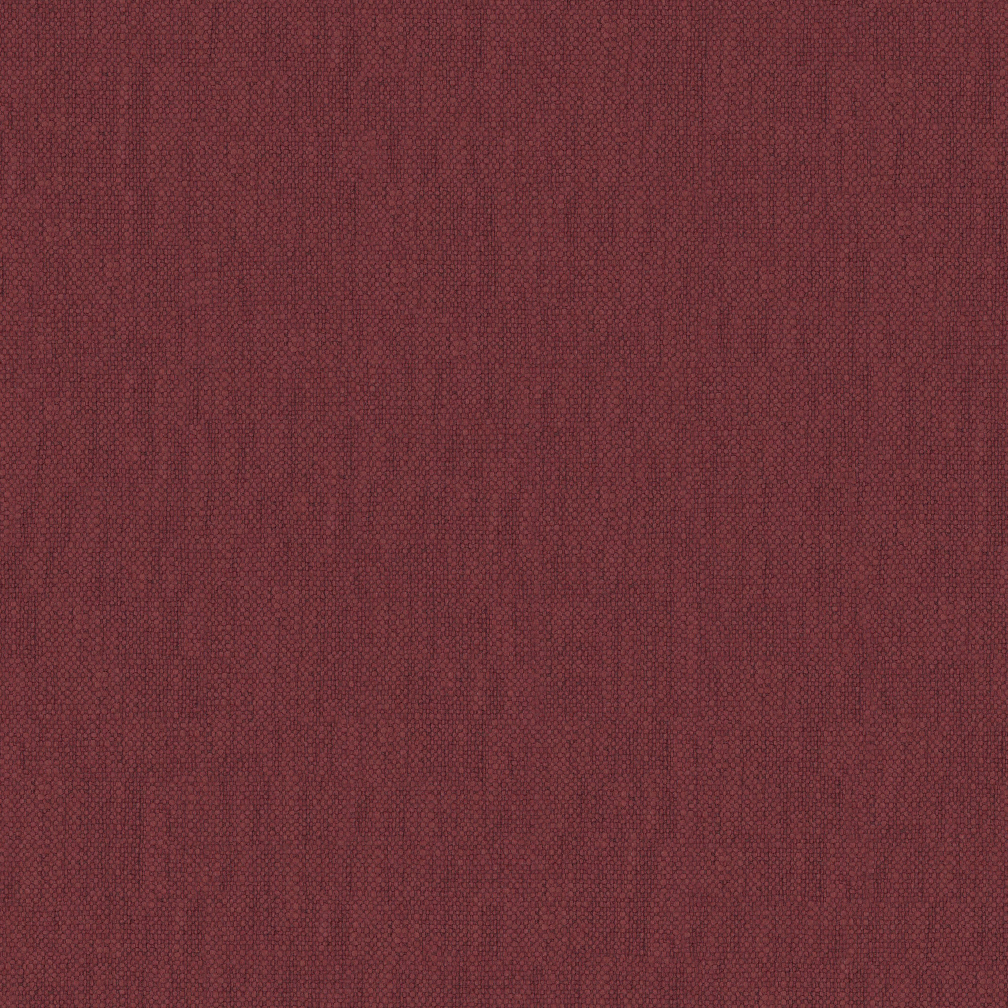 Seamless natural stone surface with small rounded red pebbles in an organic pattern
