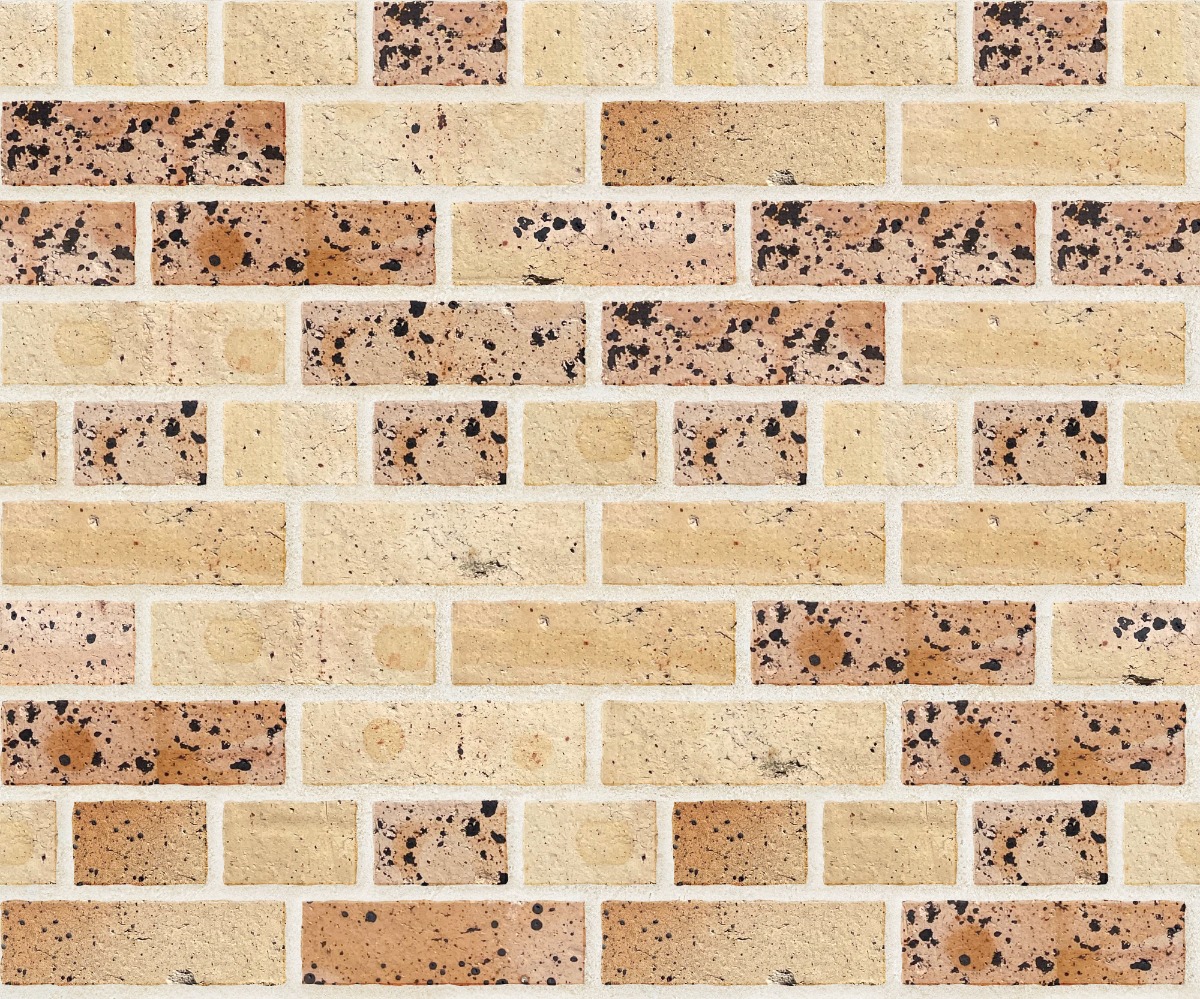 Beige clay brick wall with dark speckles in running bond pattern and light mortar joints