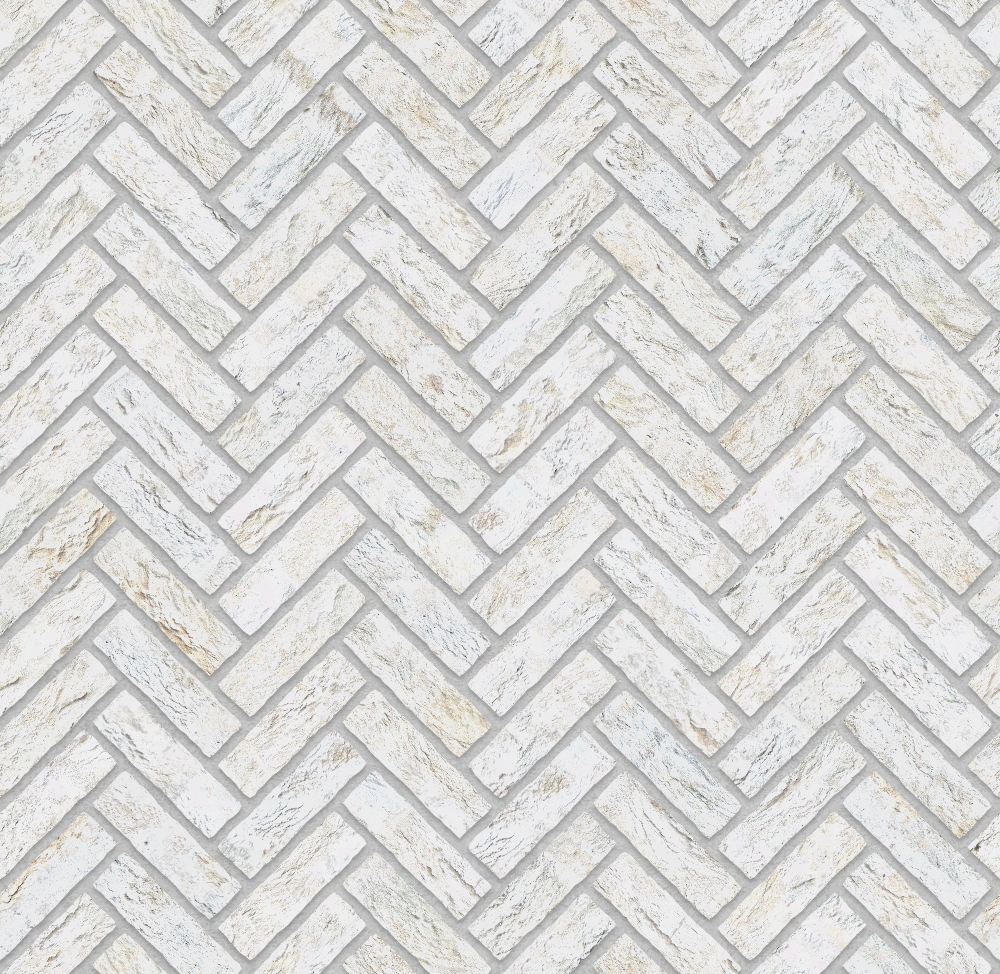 White brick wall arranged in a herringbone pattern with textured surface, suitable for wall decor.