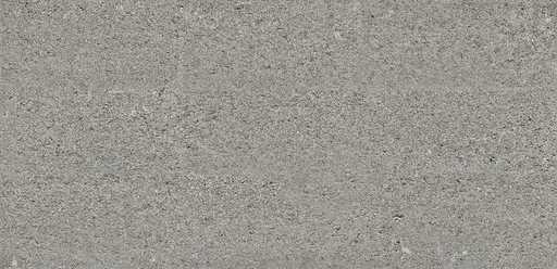 Gray rough concrete surface with textured finish, suitable for floors and walls in industrial or modern interiors.