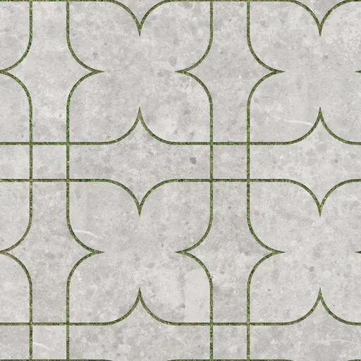 gray concrete paving plates with four-leaf clover pattern and grass visible in the joints