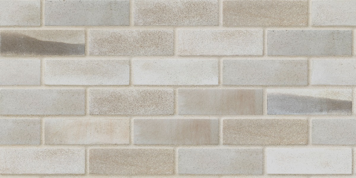 Light beige sandstone bricks arranged in stretcher bond pattern with rough texture for wall facing