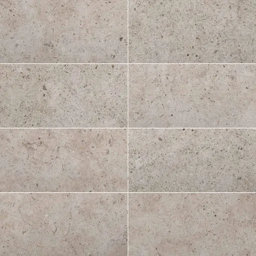 Seamless limestone tile texture in beige with speckled pattern, ideal for flooring and wall surfaces.