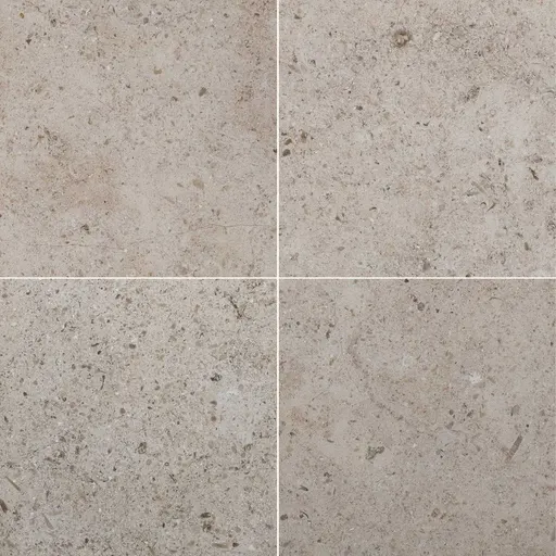 Seamless limestone tile with beige color, natural speckles, and subtle cracks, ideal for flooring and wall surfaces.
