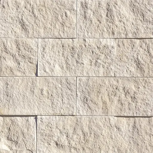 Seamless limestone wall surface with rough texture in light beige, suitable for architectural and interior use.