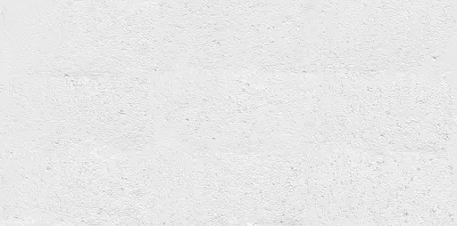 White painted concrete block wall with textured surface, suitable for interior or exterior use.